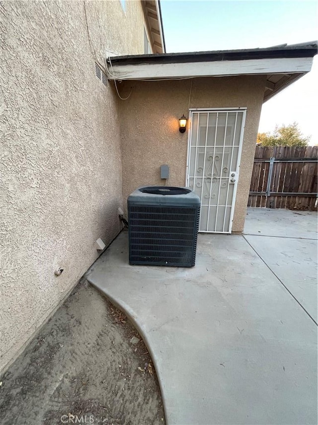 exterior details with central air condition unit