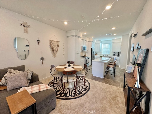 living room featuring sink