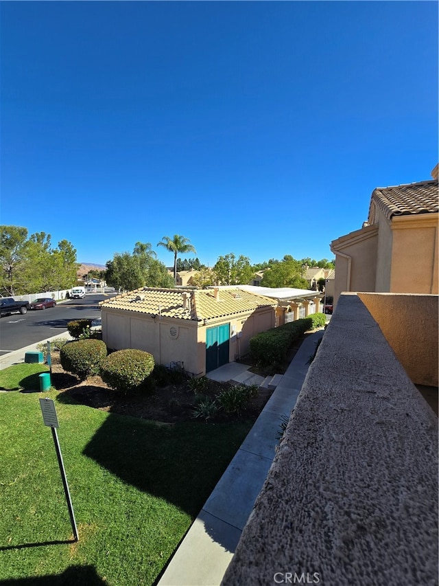 view of home's exterior featuring a lawn