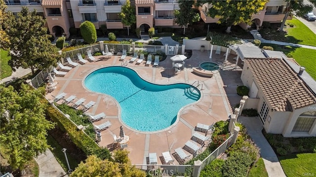 view of swimming pool featuring a patio