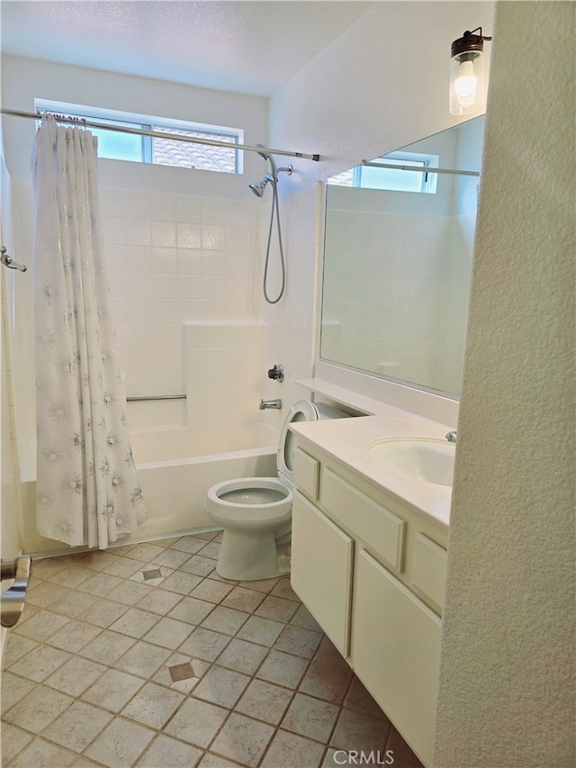 full bathroom with vanity, shower / bath combo with shower curtain, toilet, and tile patterned floors