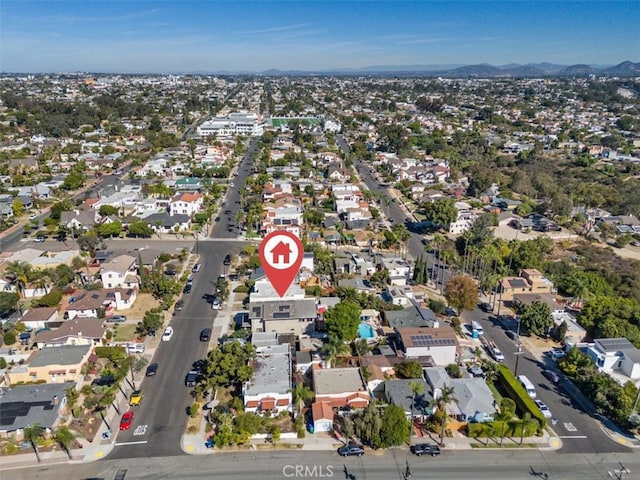 drone / aerial view featuring a mountain view