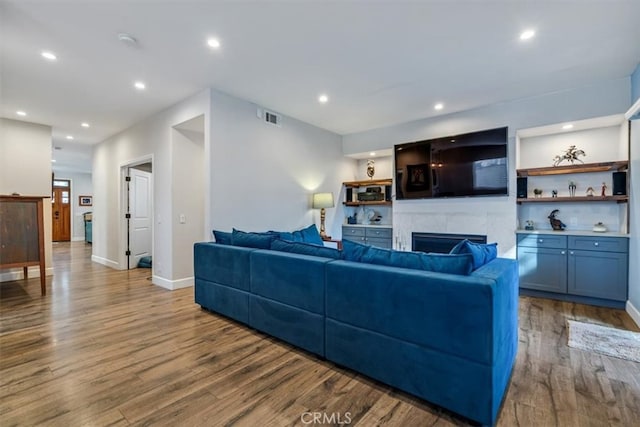 living room with light hardwood / wood-style floors