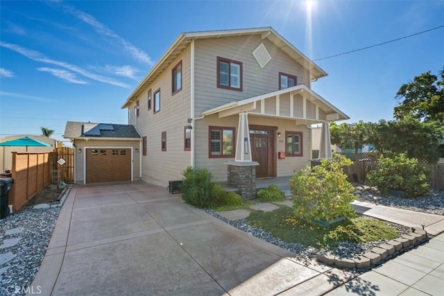 view of front facade featuring solar panels, a porch, and a garage