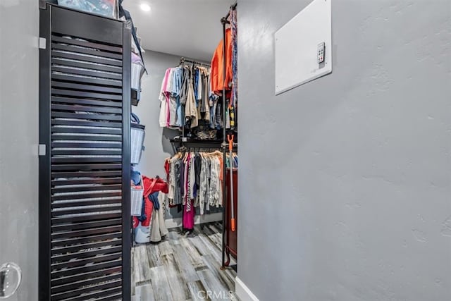 walk in closet featuring light wood-type flooring