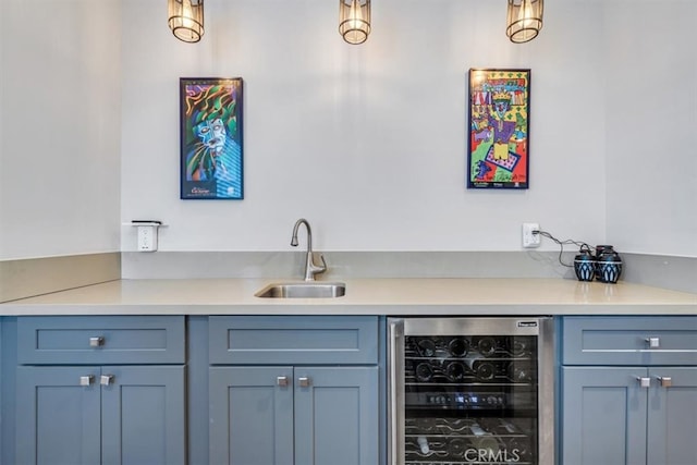 bar featuring wine cooler and sink