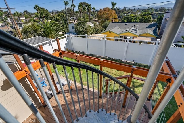 wooden deck with a yard