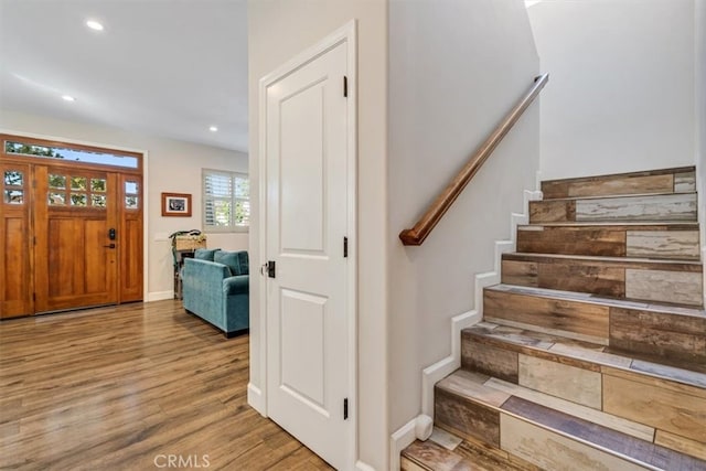 foyer entrance with light hardwood / wood-style flooring