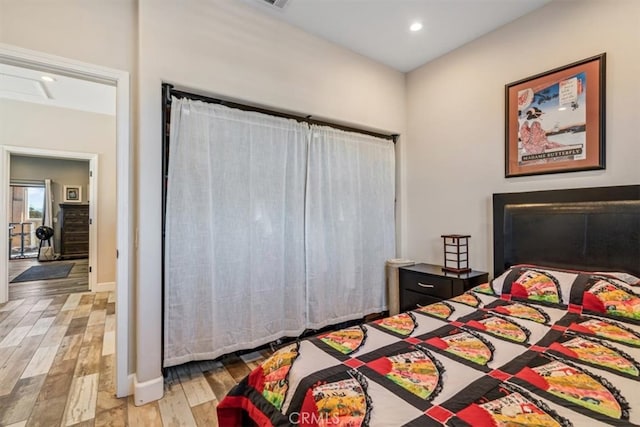 bedroom featuring light wood-type flooring