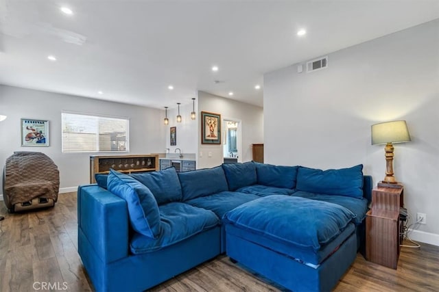 living room with hardwood / wood-style flooring