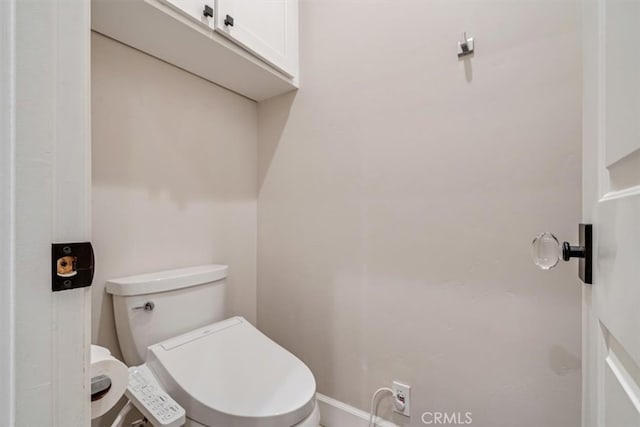 bathroom featuring toilet