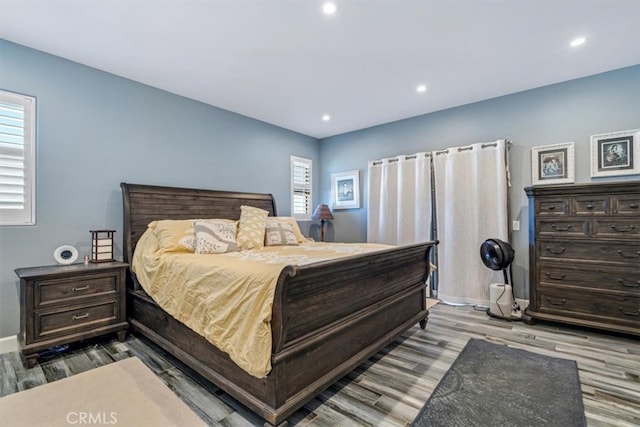 bedroom featuring hardwood / wood-style floors