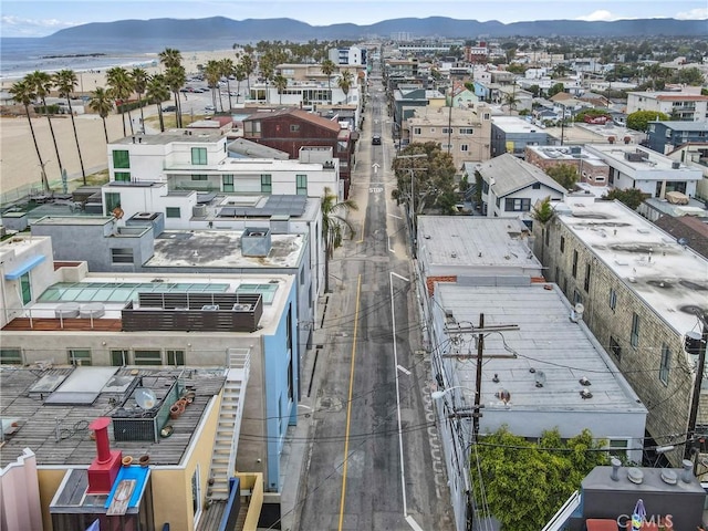 drone / aerial view featuring a mountain view