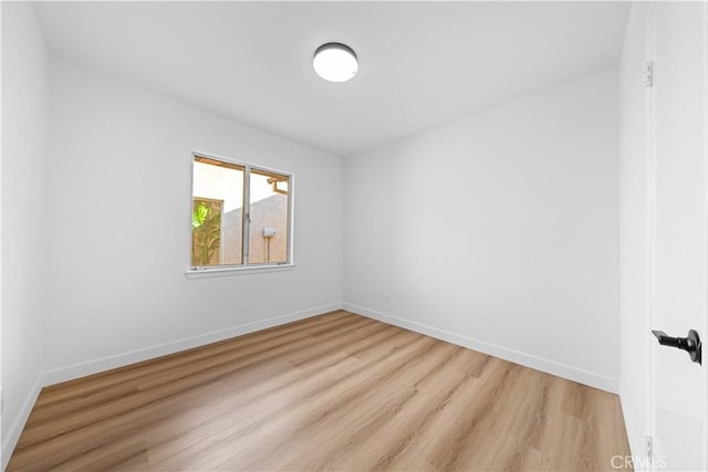 empty room with light wood-type flooring