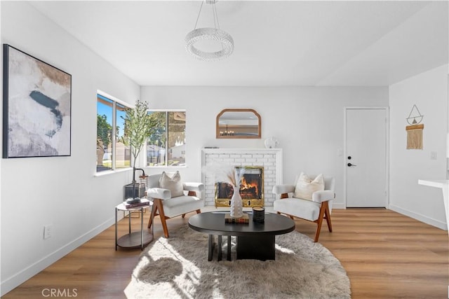 interior space with hardwood / wood-style flooring and a fireplace