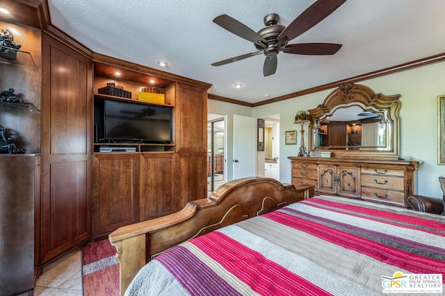 bedroom with ceiling fan, ensuite bathroom, a textured ceiling, a closet, and light tile patterned floors