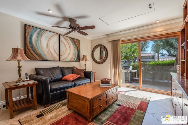 tiled living room featuring ceiling fan and crown molding