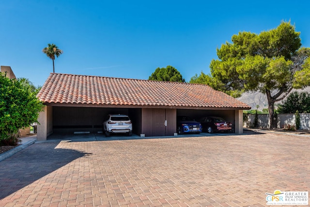 garage with a carport