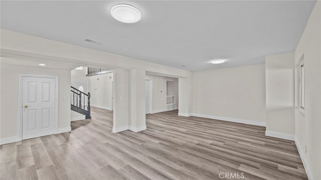 basement with light wood-type flooring