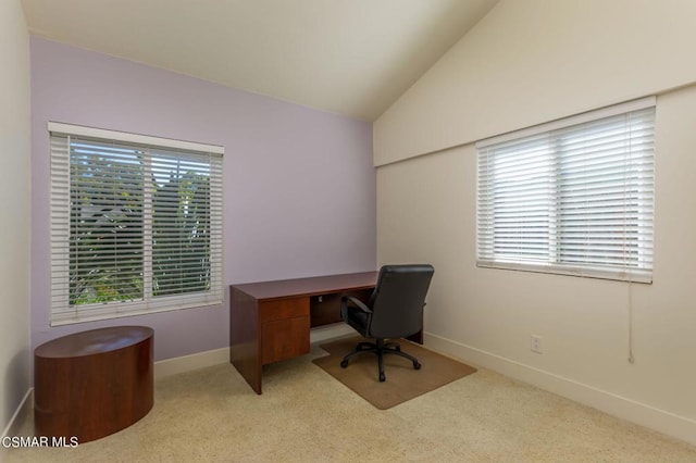 office featuring light carpet and lofted ceiling