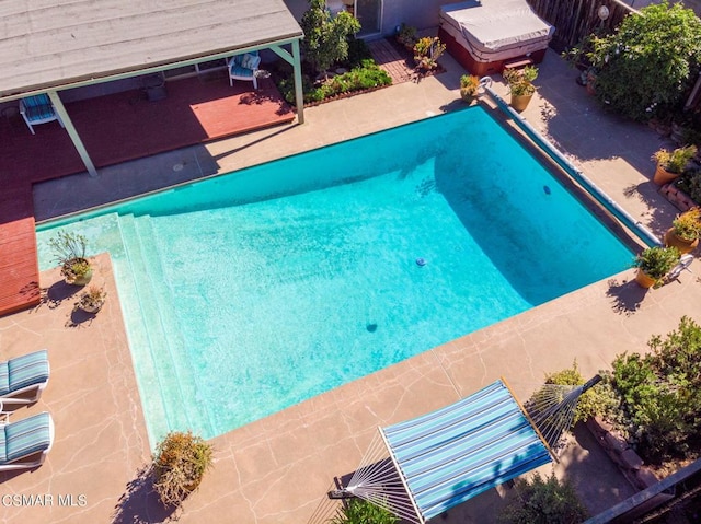 view of pool with a patio area