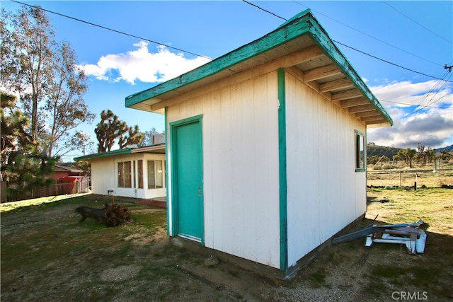 view of home's exterior with a yard