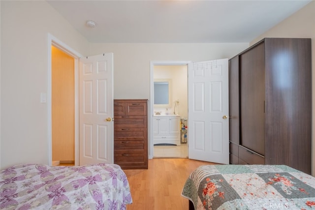 bedroom with light hardwood / wood-style flooring