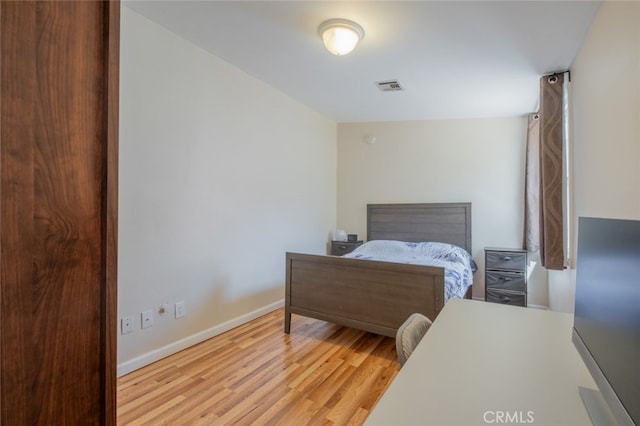 bedroom featuring light hardwood / wood-style flooring