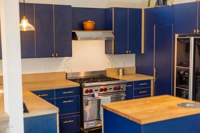 kitchen featuring range hood, wood counters, designer range, pendant lighting, and blue cabinets