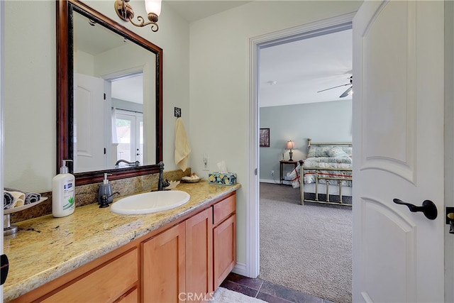 bathroom with vanity and ceiling fan