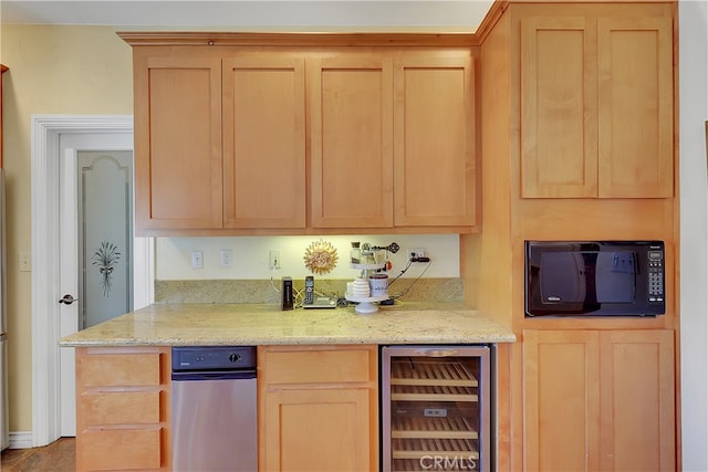 kitchen with light stone countertops, light brown cabinets, and beverage cooler