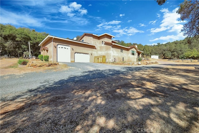 view of front of home with a garage