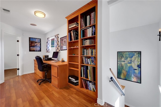 office space featuring light hardwood / wood-style floors