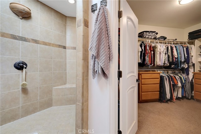 bathroom featuring tiled shower