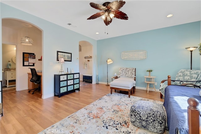 sitting room with light hardwood / wood-style flooring and ceiling fan