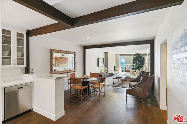 interior space with beamed ceiling and dark hardwood / wood-style flooring