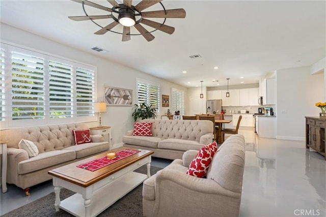 living room featuring ceiling fan