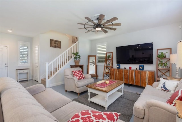 living room featuring ceiling fan