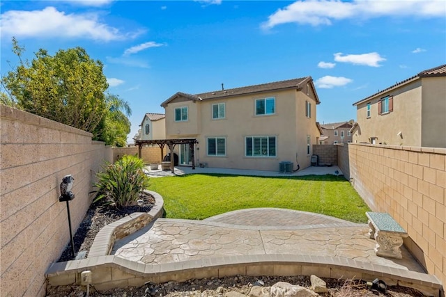 rear view of house featuring central air condition unit, a patio, a lawn, and a pergola