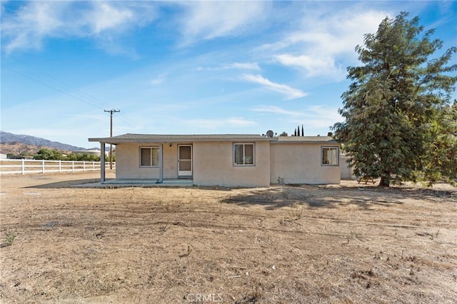 view of front of property featuring a mountain view