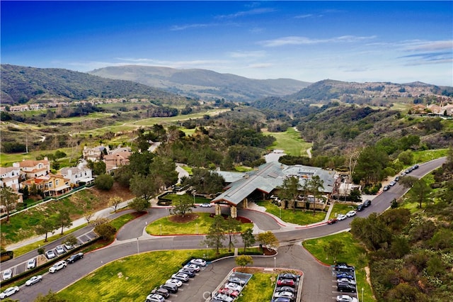 birds eye view of property with a mountain view