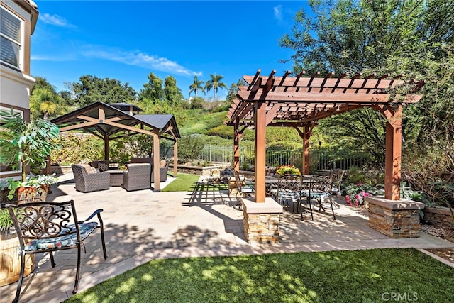 view of patio / terrace featuring a pergola and an outdoor hangout area