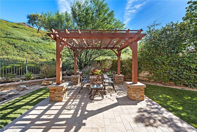 view of patio featuring a pergola