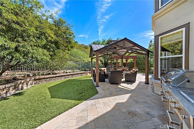 view of patio with a gazebo, an outdoor living space, and area for grilling