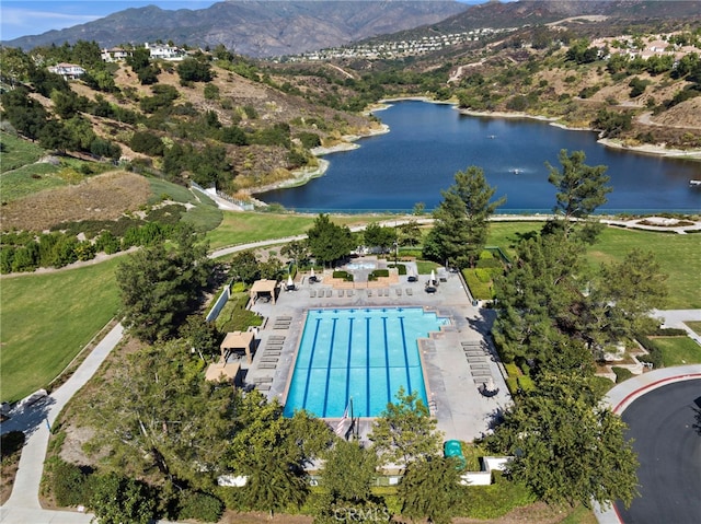 bird's eye view featuring a water and mountain view