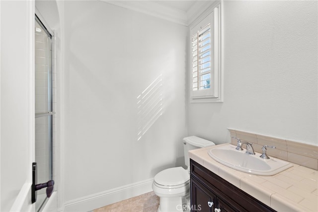 full bathroom with shower / bath combination with glass door, vanity, ornamental molding, and toilet