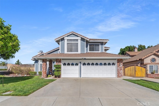 view of front facade featuring a front yard and a garage