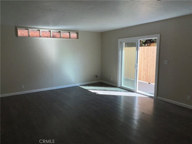 unfurnished room featuring hardwood / wood-style floors