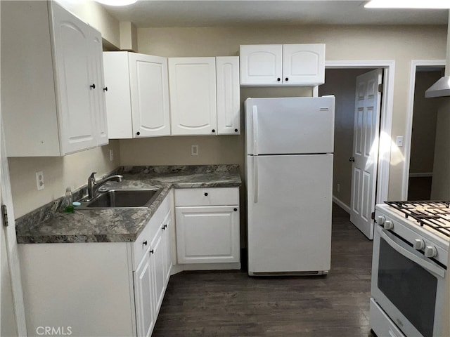 kitchen with white cabinetry, dark hardwood / wood-style flooring, white appliances, and sink