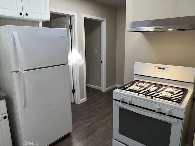 kitchen with white appliances, dark hardwood / wood-style floors, white cabinetry, and range hood